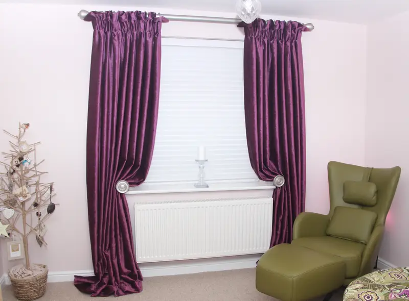 Plum silk made to measure curtains in a bedroom by Heather Horrocks Leigh